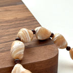 BS136 [Drifting Memories] Shell Garnet Bracelet