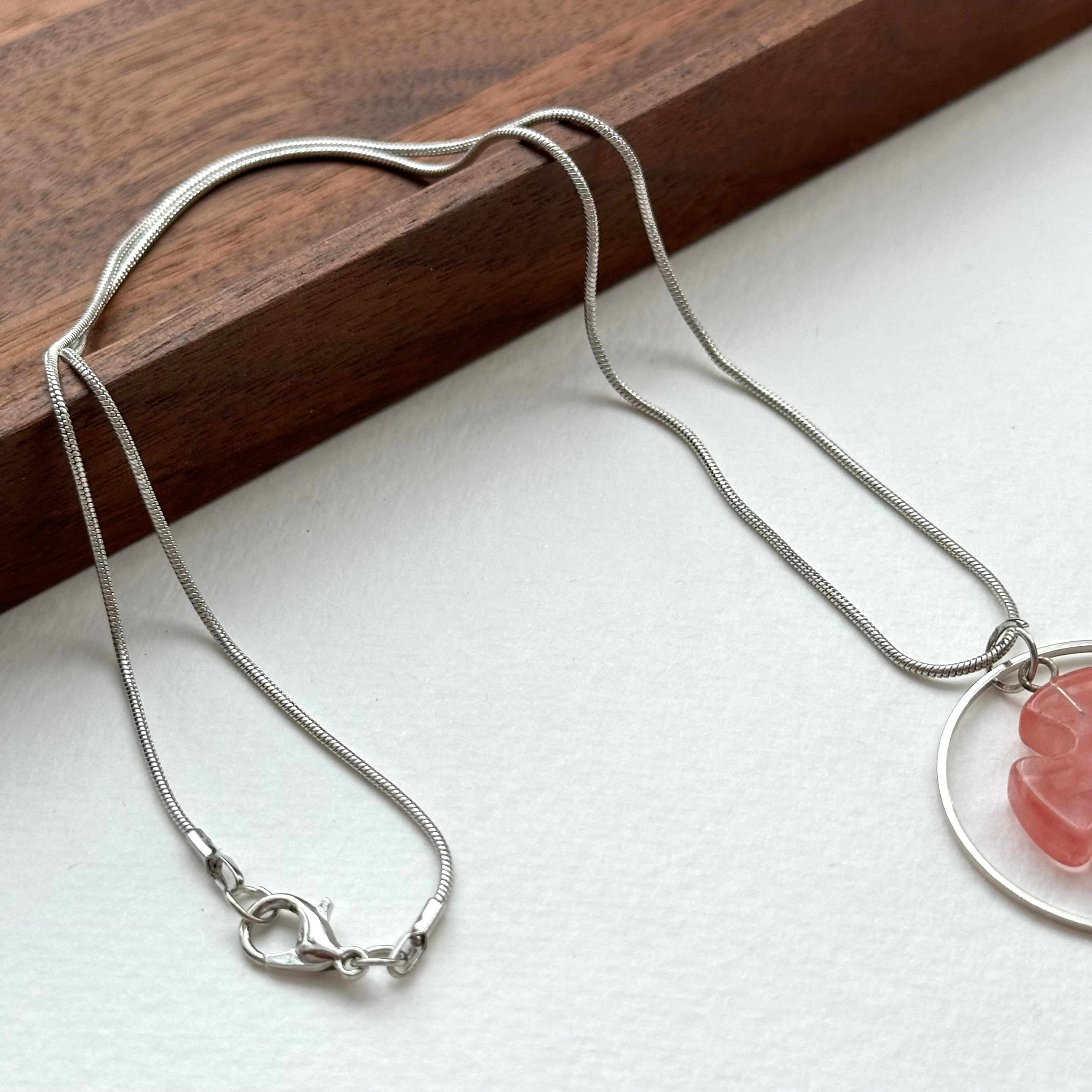 N38 [Lucky Glass] Watermelon Red Cross Puzzle Round Silver-plated Necklace