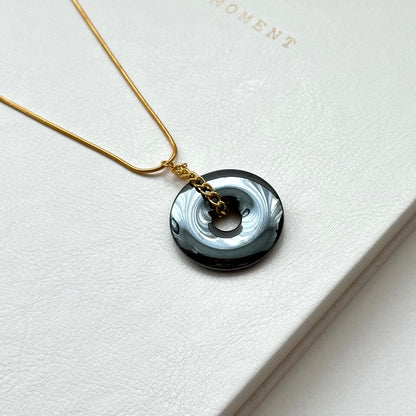 N68 [Protection and Implementation] Hematite Peace Buckle Gold-plated Necklace