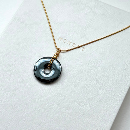 N68 [Protection and Implementation] Hematite Peace Buckle Gold-plated Necklace