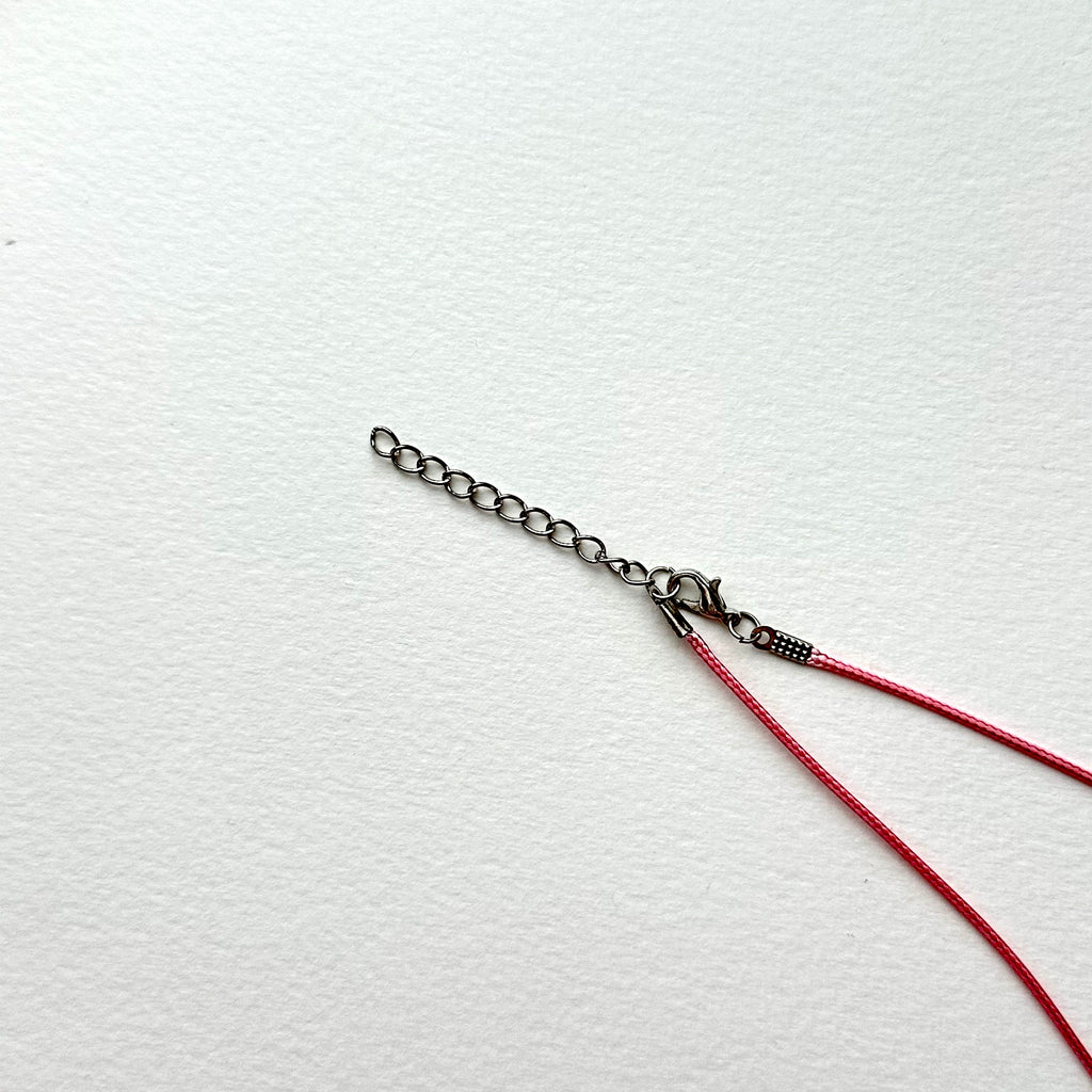 N90【Protection and Implementation】Hematite Peace Buckle Gold-plated Necklace