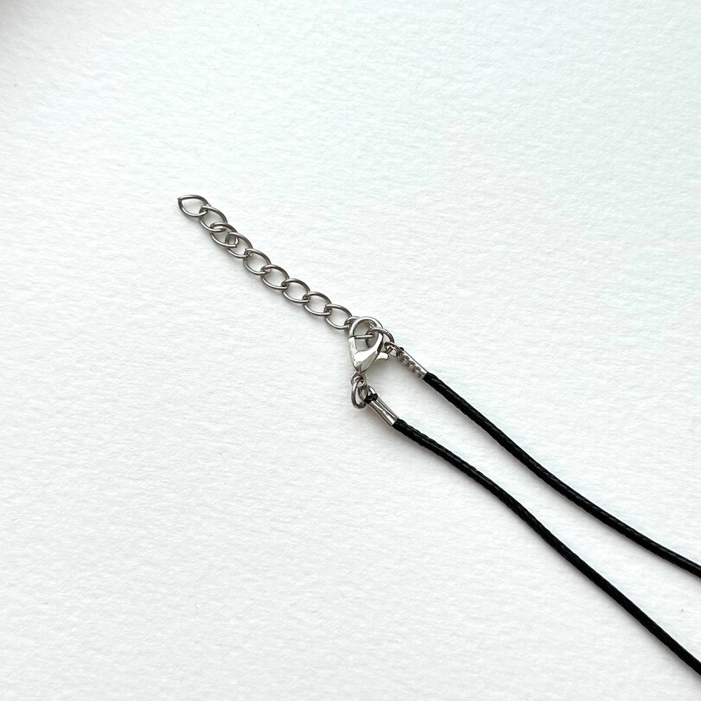 N90【Protection and Implementation】Hematite Peace Buckle Gold-plated Necklace