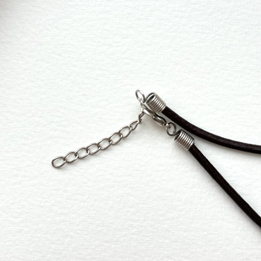 N90【Protection and Implementation】Hematite Peace Buckle Gold-plated Necklace