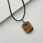 N90【Protection and Implementation】Hematite Peace Buckle Gold-plated Necklace