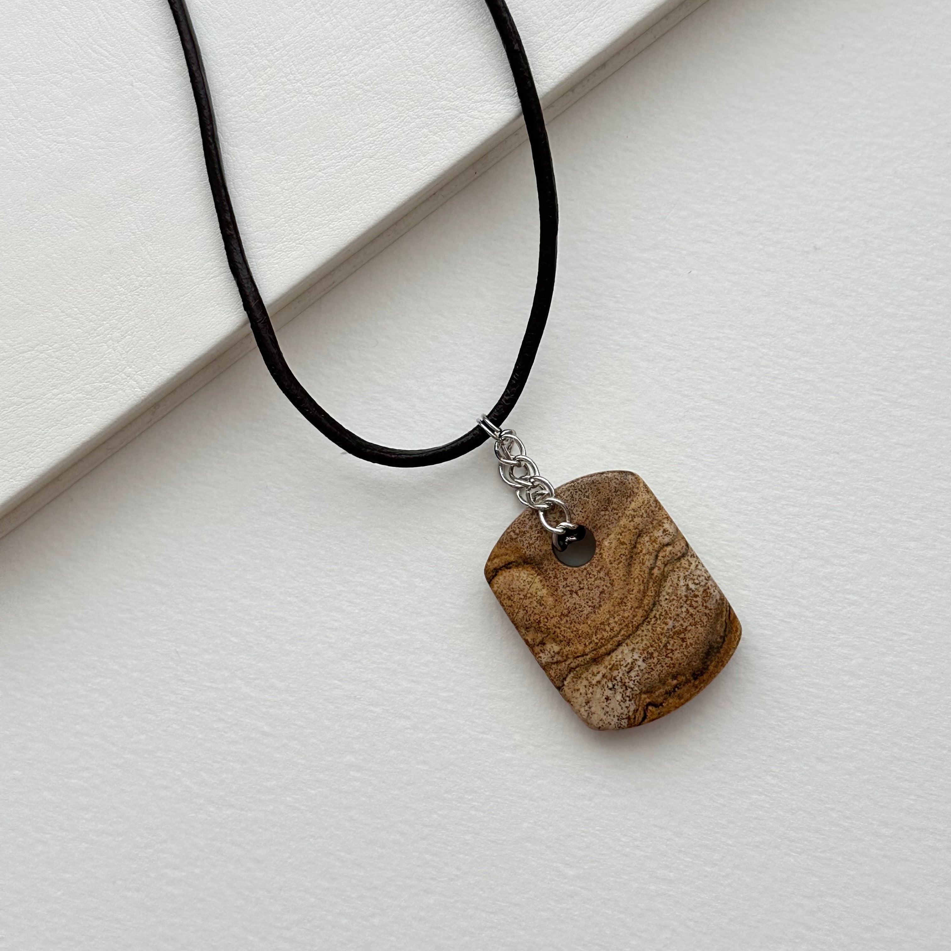 N90【Protection and Implementation】Hematite Peace Buckle Gold-plated Necklace