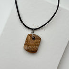 N90【Protection and Implementation】Hematite Peace Buckle Gold-plated Necklace