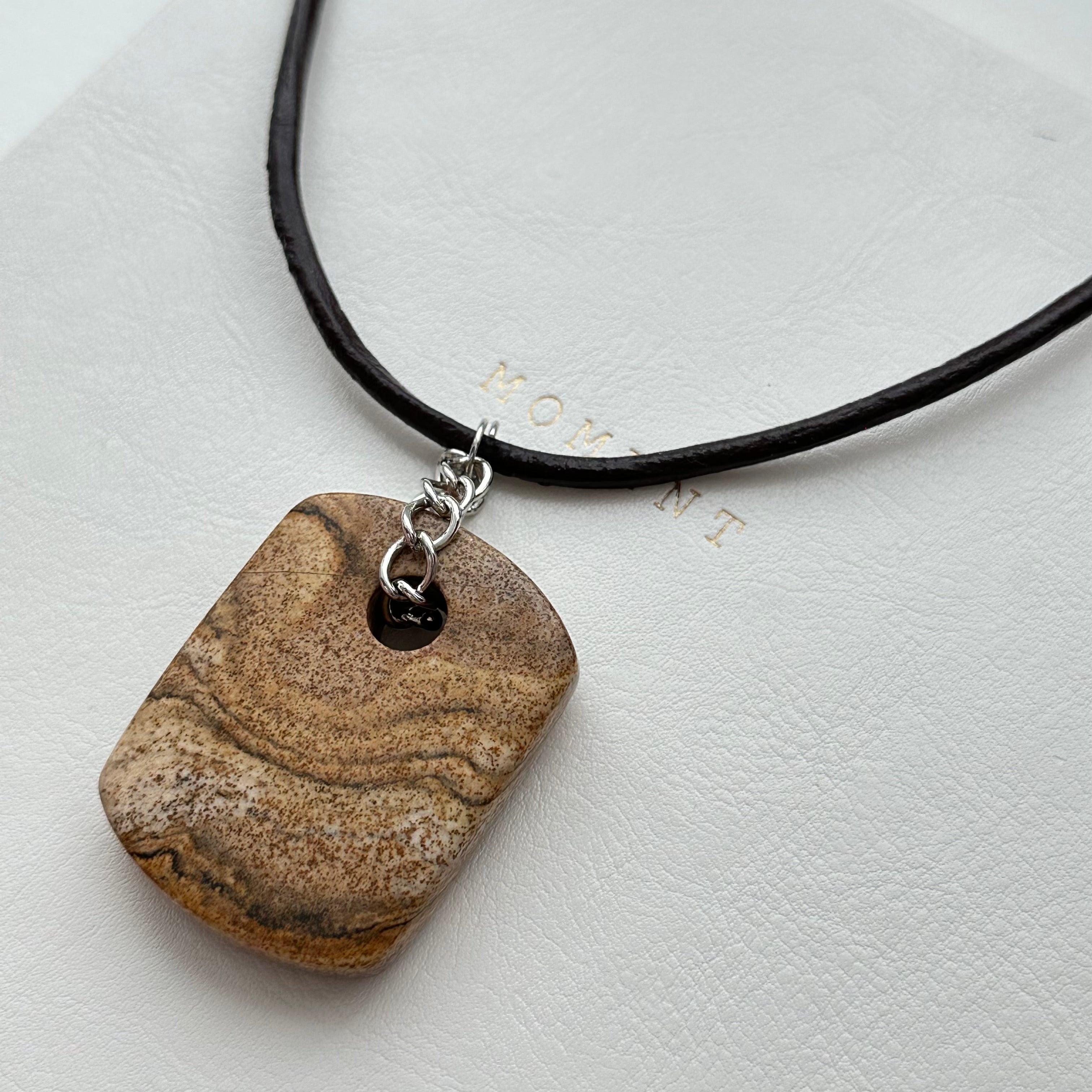 N90【Protection and Implementation】Hematite Peace Buckle Gold-plated Necklace