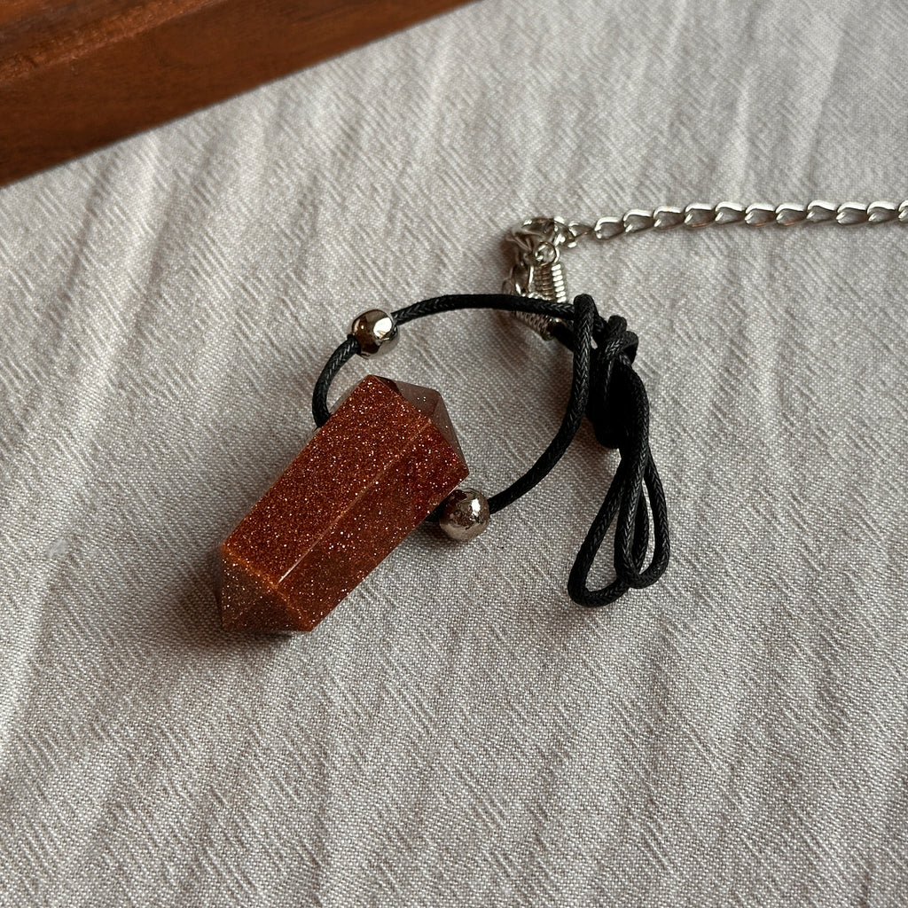 N90【Protection and Implementation】Hematite Peace Buckle Gold-plated Necklace