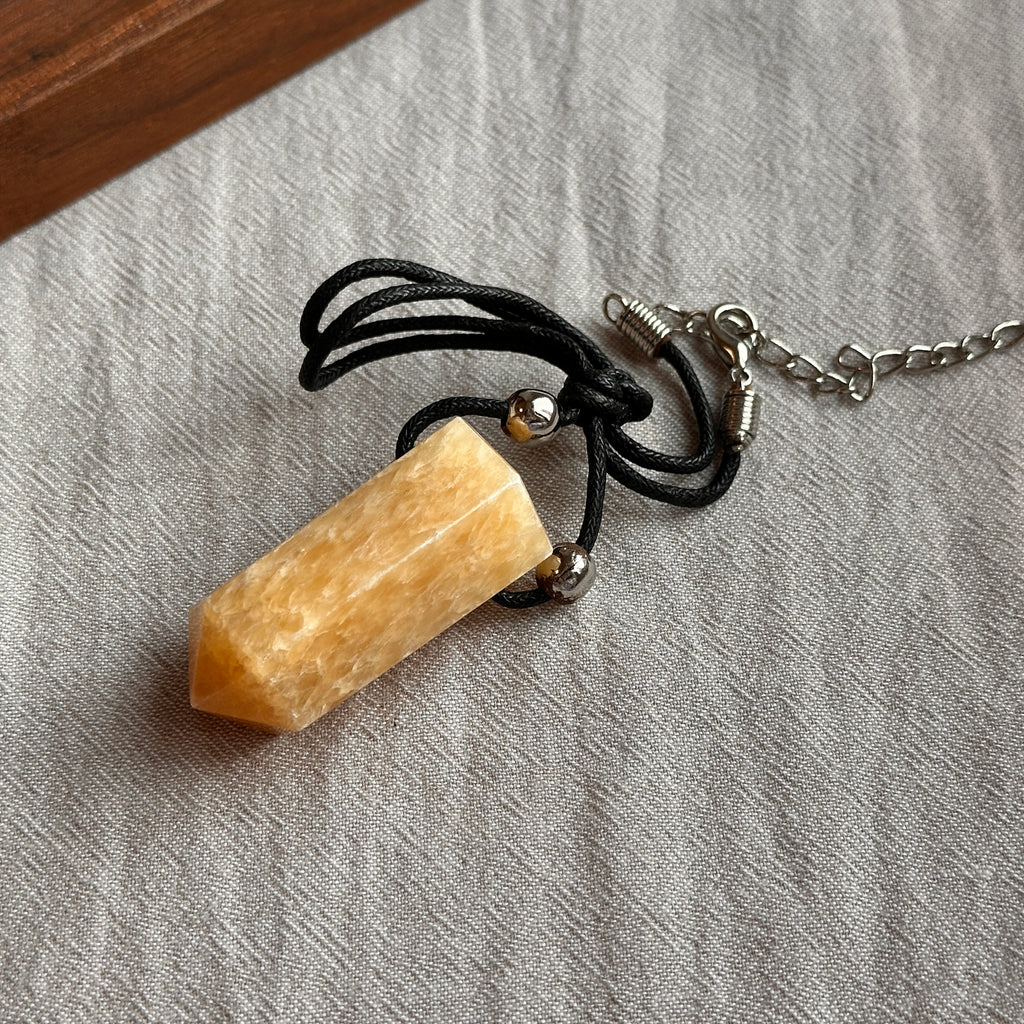 N90【Protection and Implementation】Hematite Peace Buckle Gold-plated Necklace