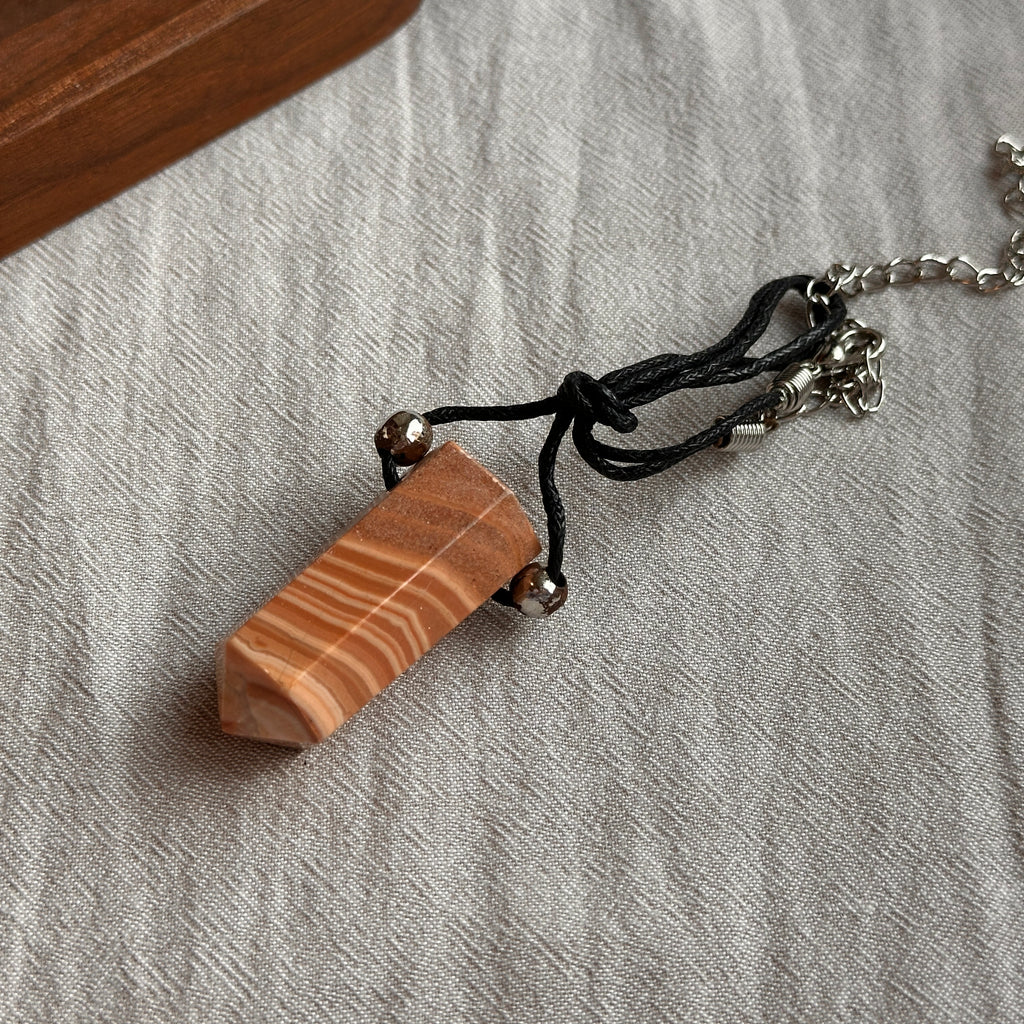 N90【Protection and Implementation】Hematite Peace Buckle Gold-plated Necklace