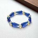 BS273 [Libra Scorpio | October] Opal Blue Glass Bracelet